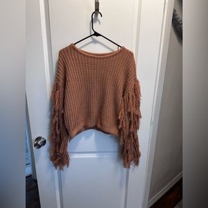 Size Small / medium Fringe Sleeve rust colored sweater from boutique